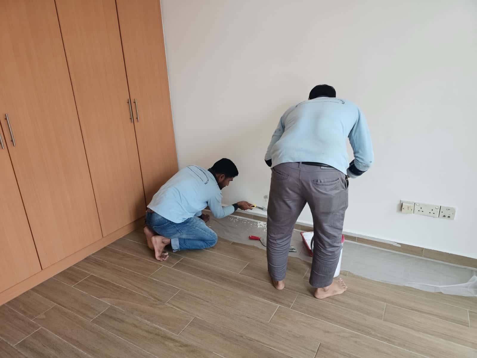 Interior wall leak repair in a Singapore condominium